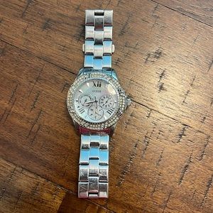 Woman’s silver Guess watch , works well needs battery